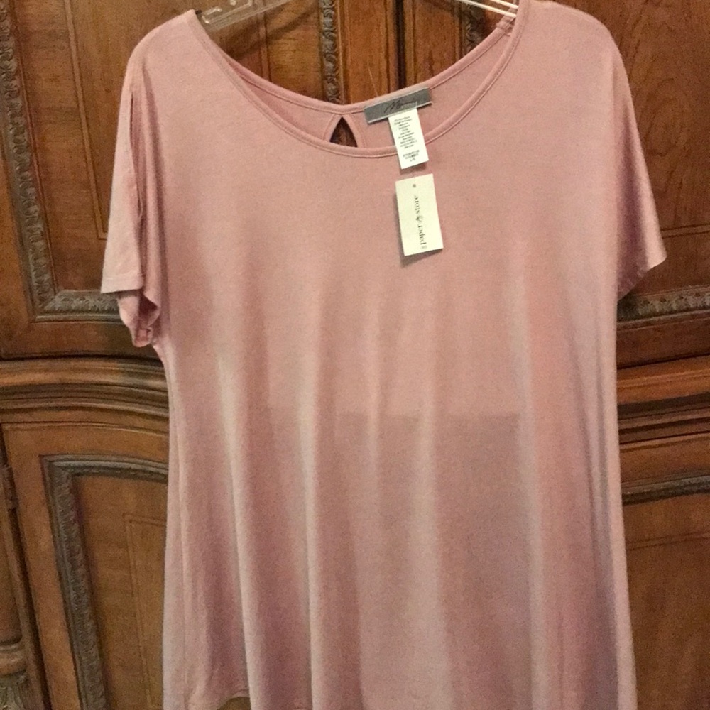 Woman’s pink top